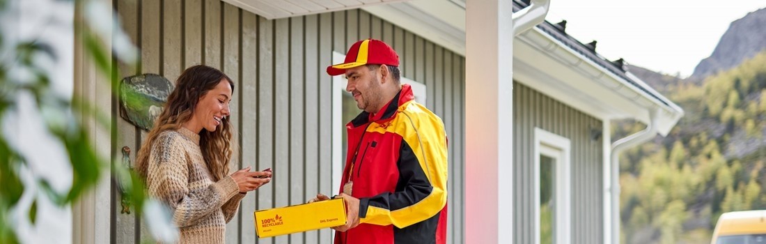 DHl Courier Delivering a Shipment